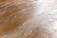 MOUNTAIN SOUL Massiver Esstisch 240cm rötlich grün schwarz oval Naturstein Eisen