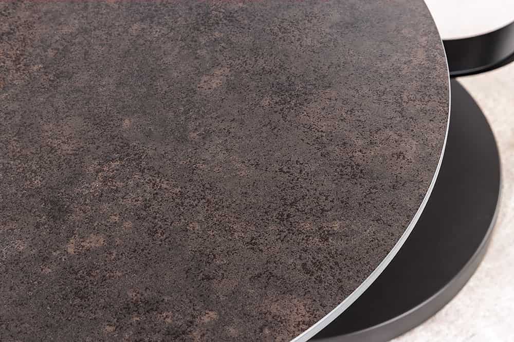 DANCING RINGS Design Couchtisch rost rund drehbar Travertin Keramik bronze Gestell