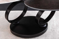 DANCING RINGS Design Couchtisch rost rund drehbar Travertin Keramik bronze Gestell