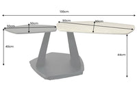 MOVEMENT Design Couchtisch rost fünfeckig drehbar Travertin Keramik schwarz Metall