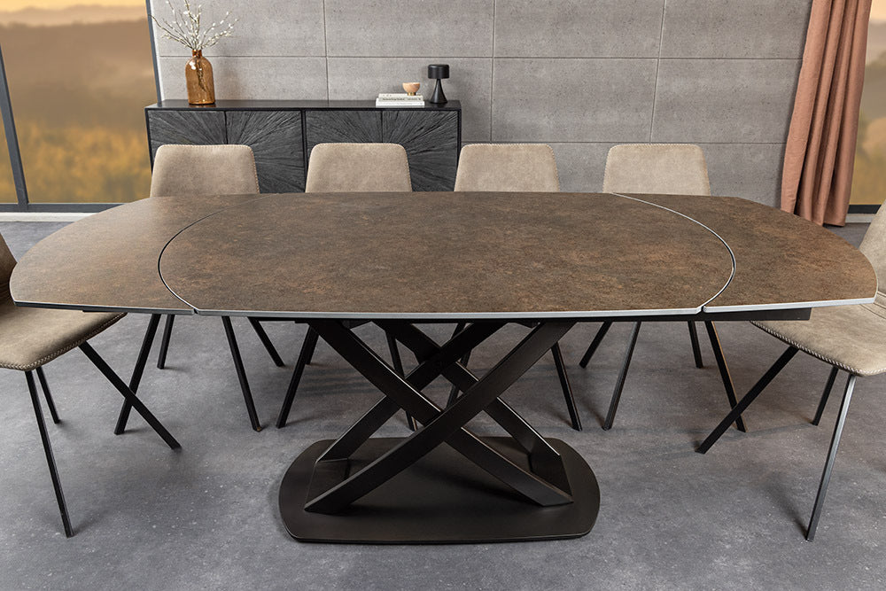 INCEPTION Ausziehbarer Esstisch 130-190cm rost oval Keramik bronze Gestell